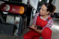 AdobeStock_336344390_female_inspect_truck.jpeg