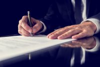 Dollarphotoclub_66778551_signing_document.jpg