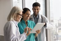 as1025872538-doctor-enjoy-easy-work-with-tablet.jpeg