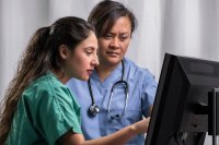 as203946867-medical-team-with-computer-screen.jpeg