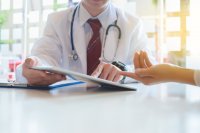 as292177785-Doctor-discussing-WorkTracker-mobile-timesheet.jpeg