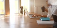 as310608749_businesswoman_laptop_computer_coffee.jpeg