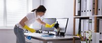 as314708902_woman_cleaning_monitors.jpeg
