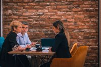 as328967968-three-people-working-on-project-in-cafe.jpeg