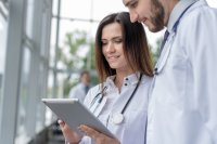 as364297885_medical_team_with_tablet.jpeg