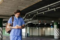 as864928200-doctor-in-parking-log-on-smartphone.jpeg