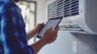 as971263272-technician-installing-air-condition.jpeg