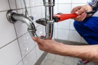 as_216282910_Plumber_Repairing_Sink.jpeg