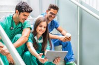 env-yr-medics-having-coffee-and-watching-tablet-2024-10-15-05-50-37-utc.jpg