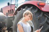 as_196919740_woman_tablet_tractor.jpeg